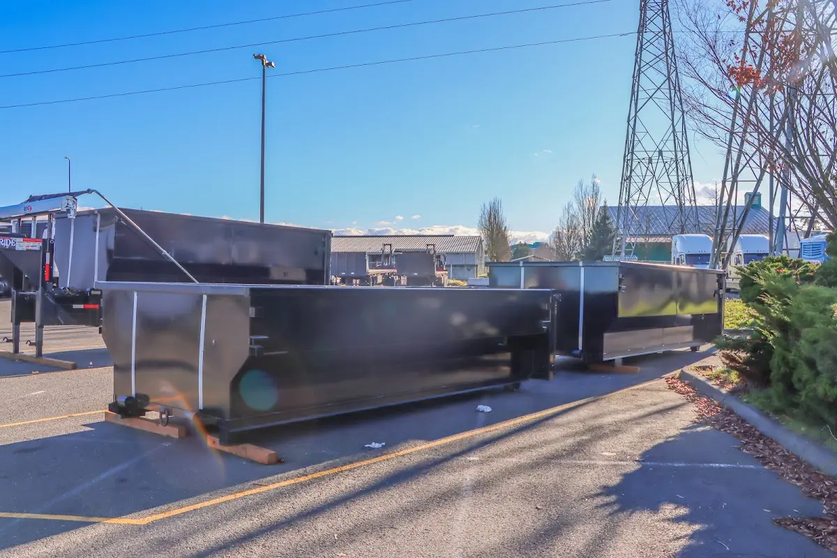 Roll-off dumpster ready for waste disposal at job site for 4 Yard Dumpster Rental in Mansfield